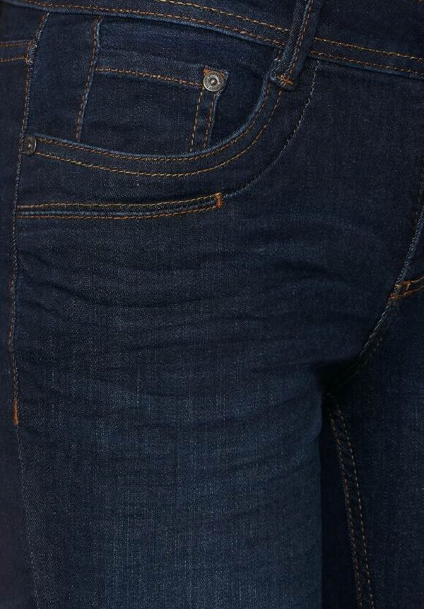 Mørkeblå jeans med slid